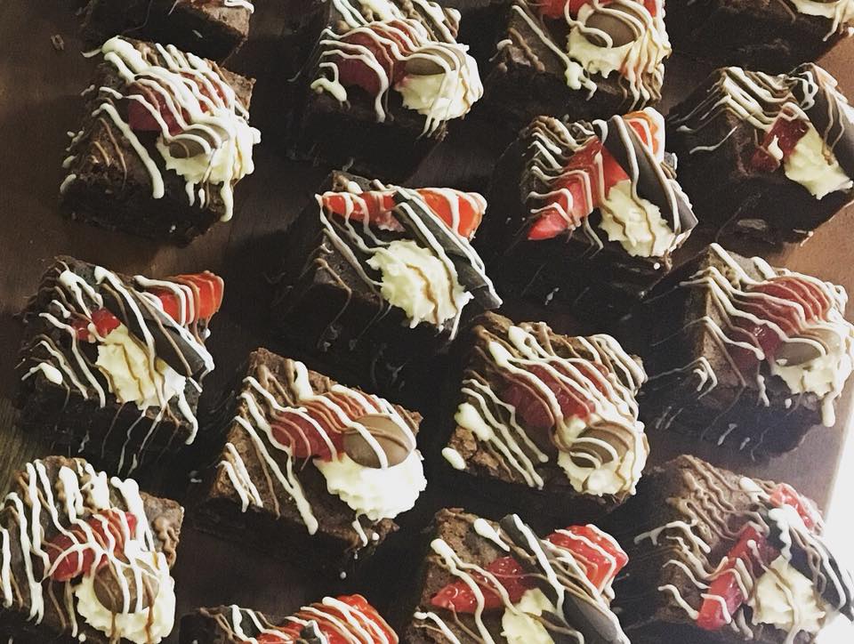 Gourmet brownies with cream and strawberries at Moat Terrace, Tudor Barn Eltham event.