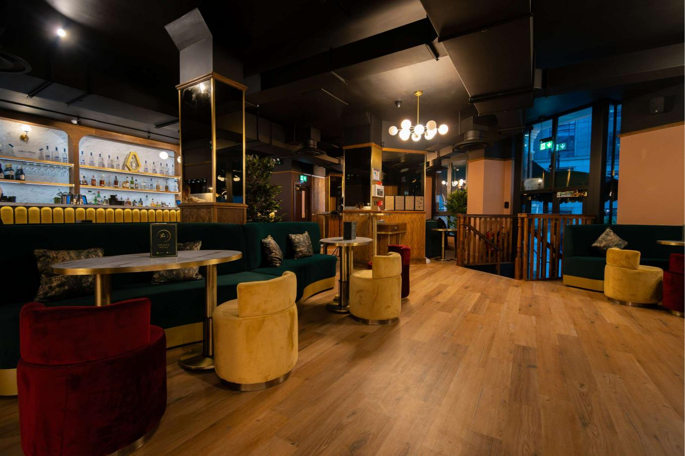 Semi-private hire area in The 1 Bar, featuring plush seating for networking events.