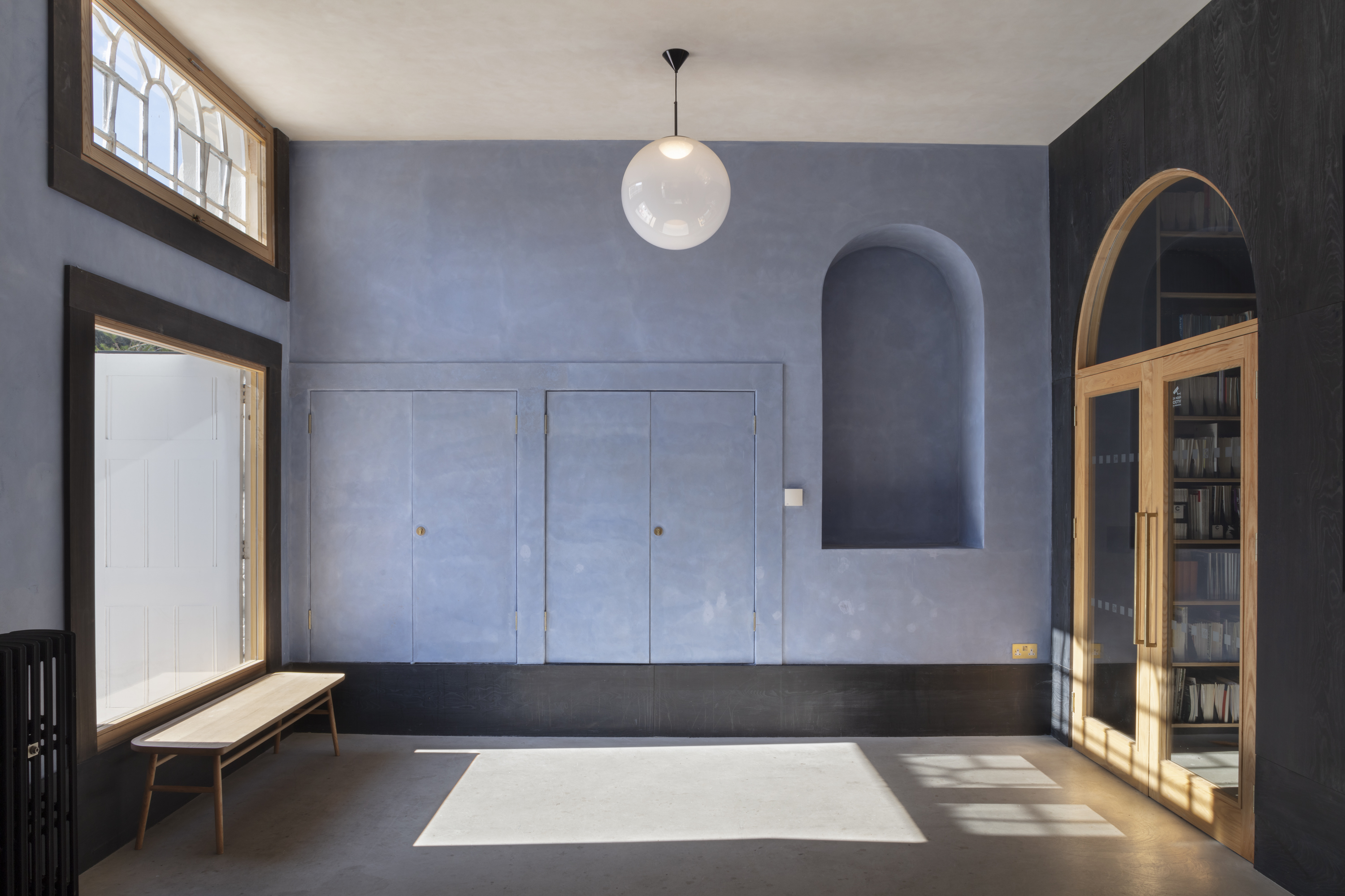 Stylish Crafts Council Gallery with calming blue walls for creative workshops.