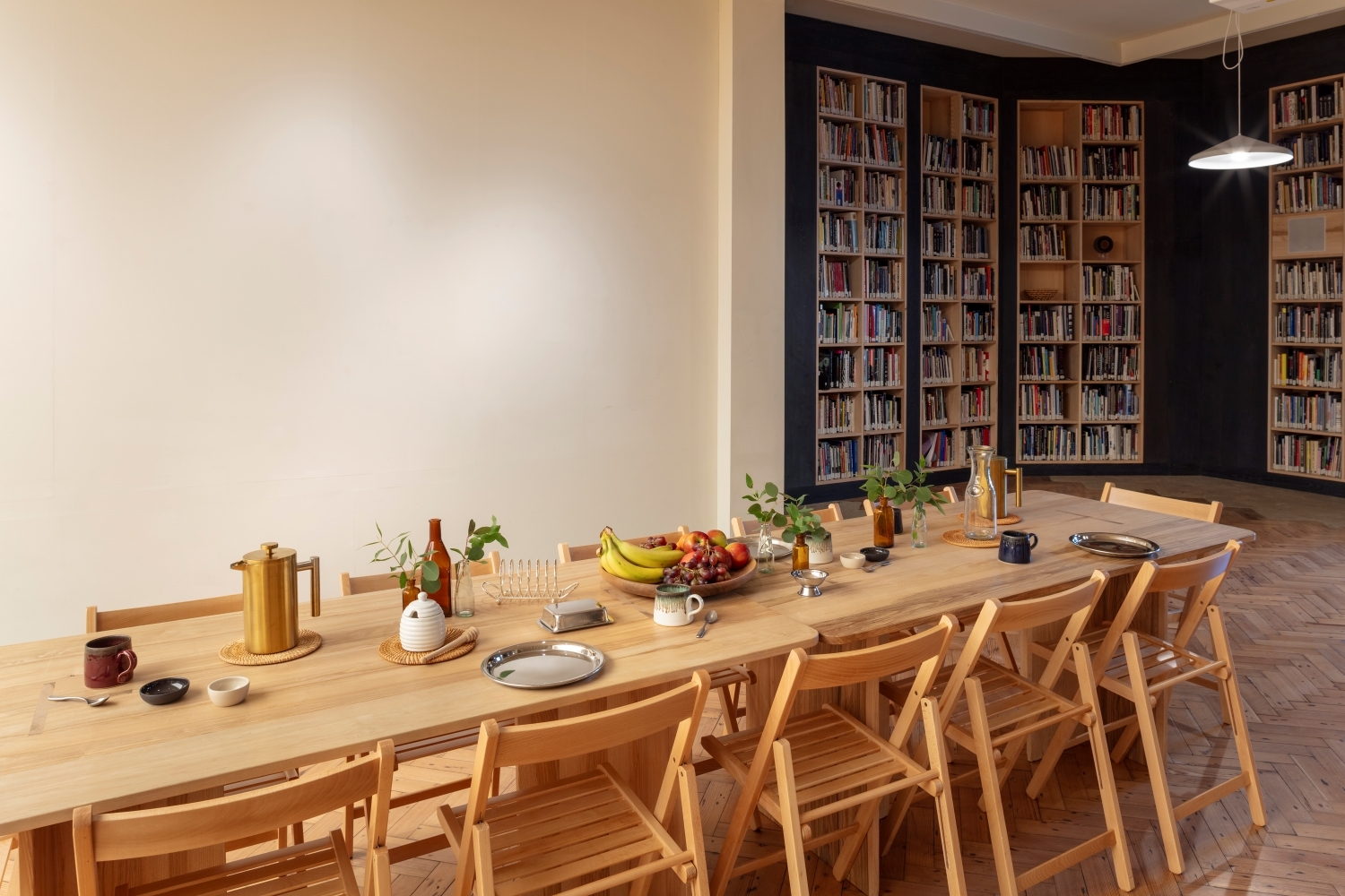 Crafts Council Gallery meeting space with long table, perfect for gatherings and brainstorming.