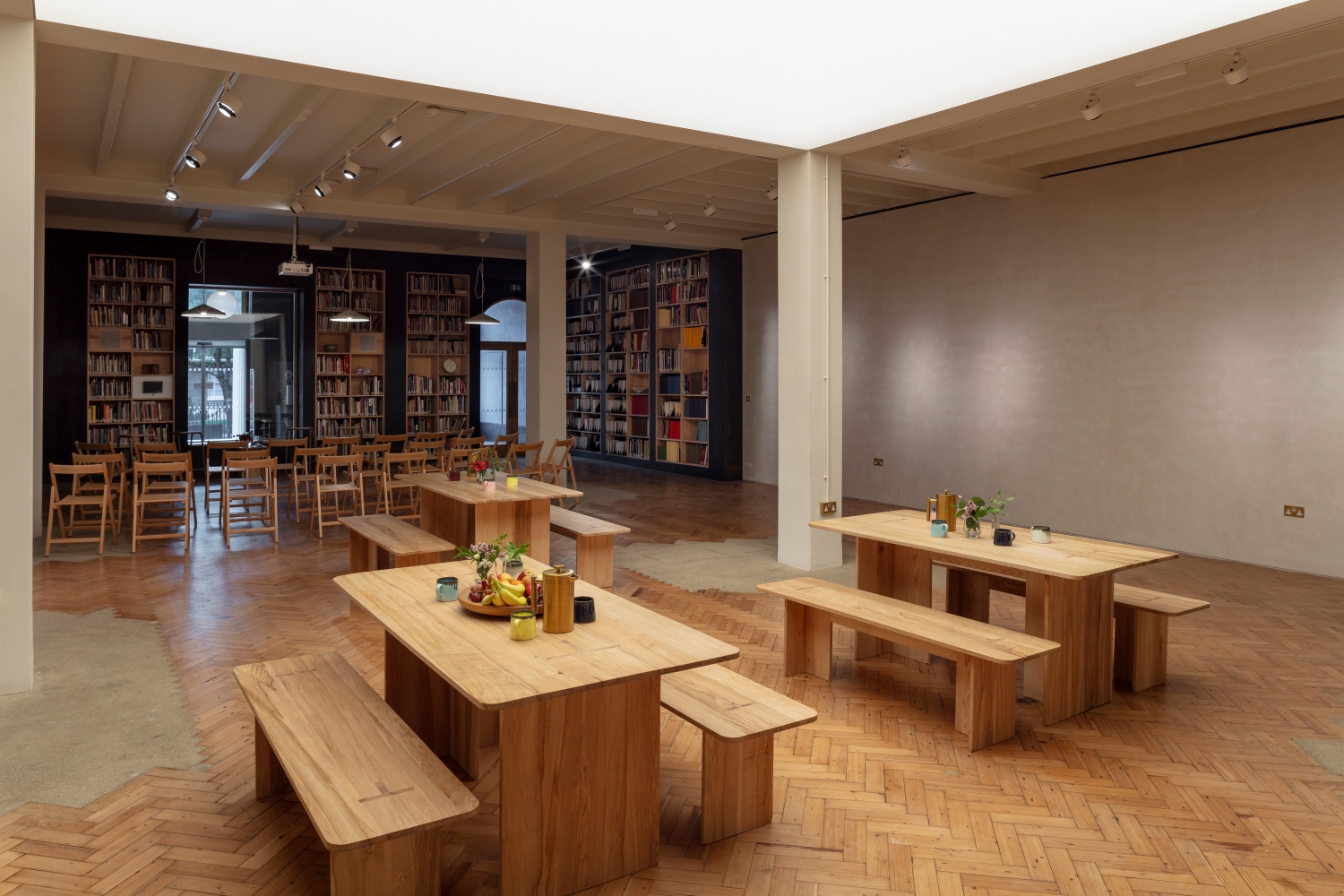 Crafts Council Gallery event space with wooden seating for intimate meetings and networking.