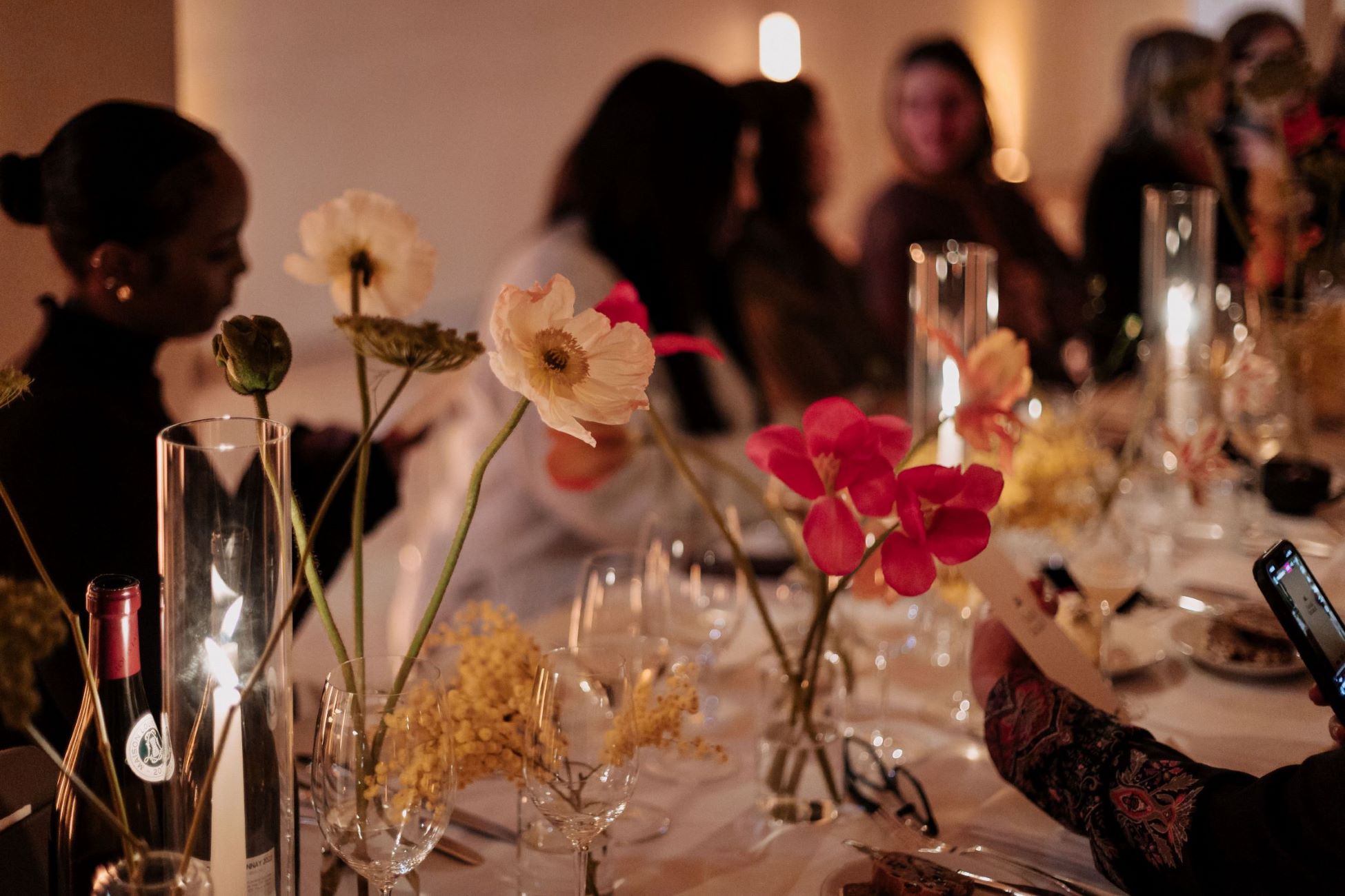 Elegant event table at Crafts Council Gallery, featuring floral centerpieces for gatherings.