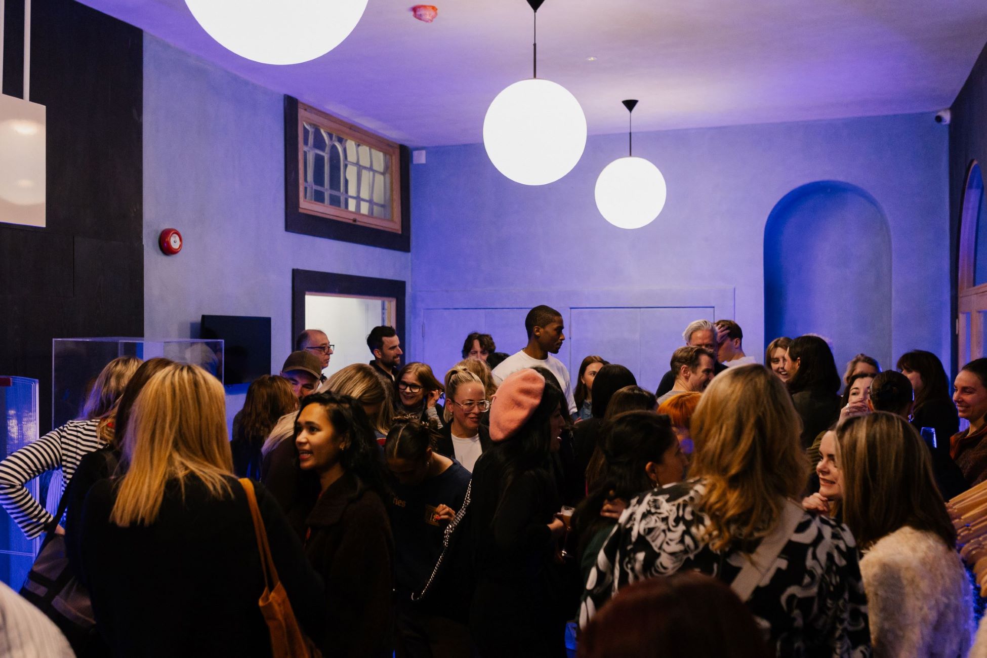"Networking event at Crafts Council Gallery with stylish decor and engaging atmosphere."