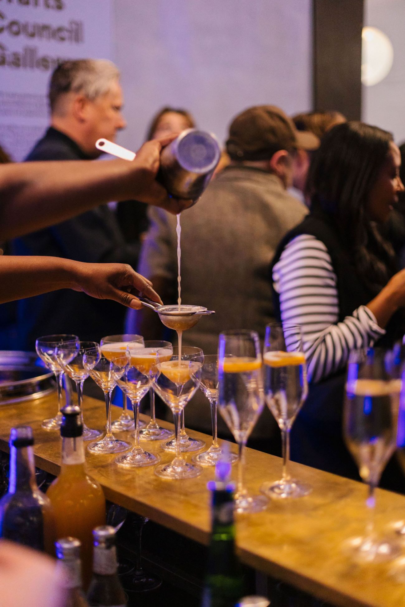 Crafts Council Gallery event with mixologist, networking and socializing atmosphere.