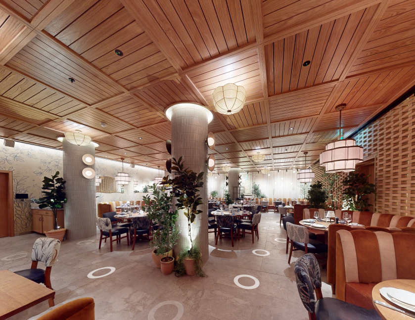 Stylish restaurant venue with warm wood accents, ideal for corporate dinners and private events.