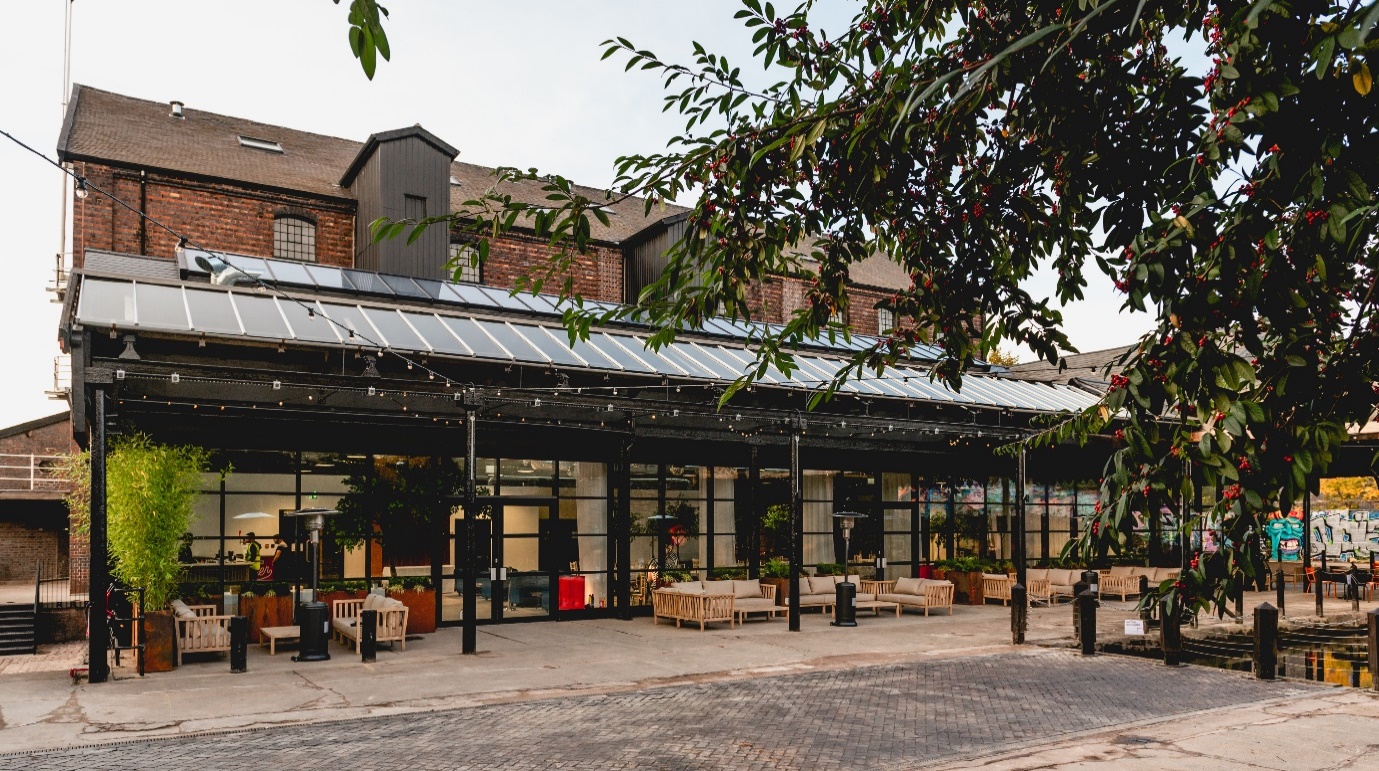 The Canopy at The Bond: modern event space with large windows for corporate meetings and gatherings.