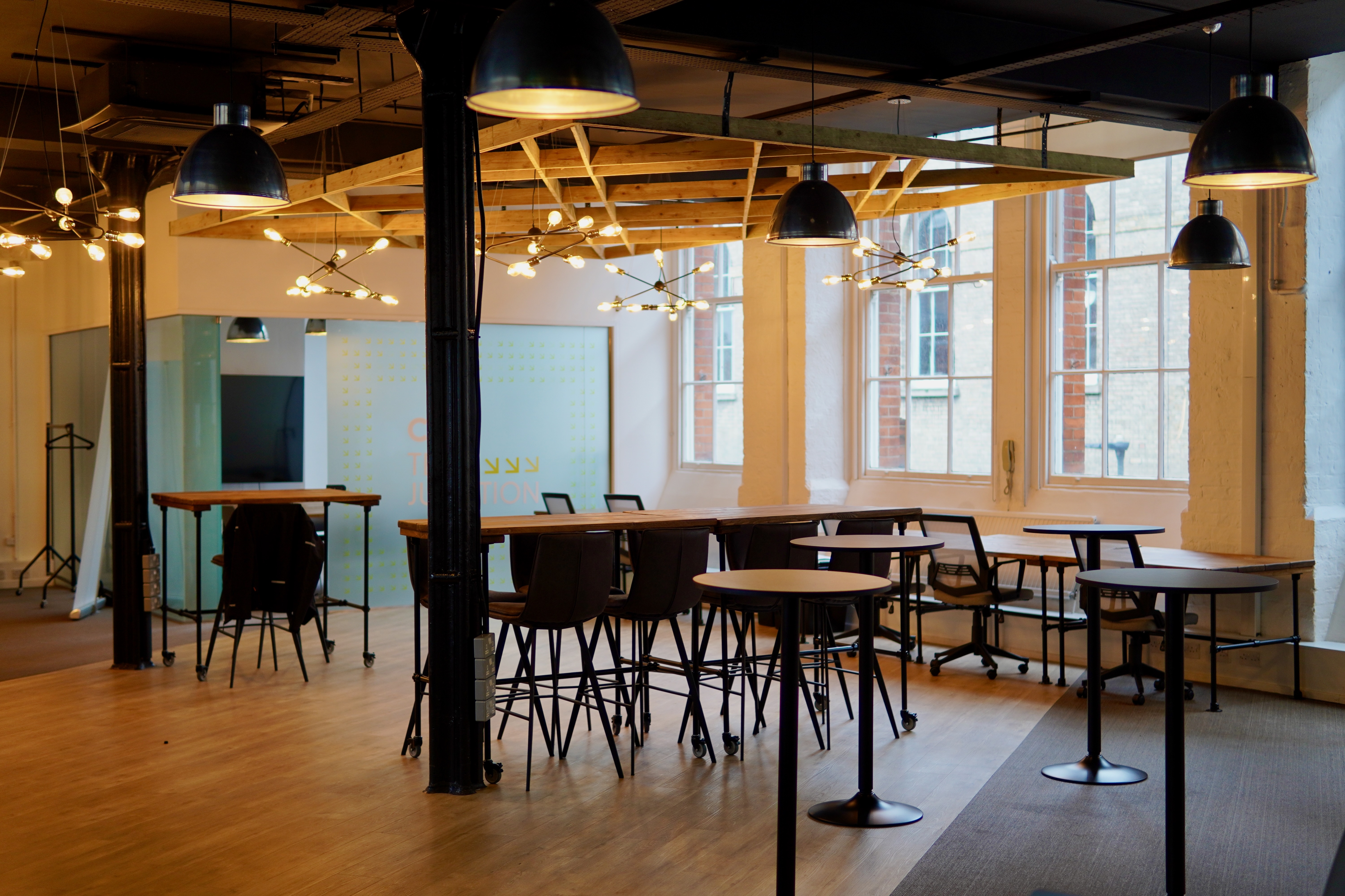 Versatile event space at Civo Tech Junction with modern furnishings for meetings and gatherings.