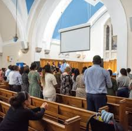 Whole Venue Potters House Wembley, spacious event with engaged attendees at seminar.