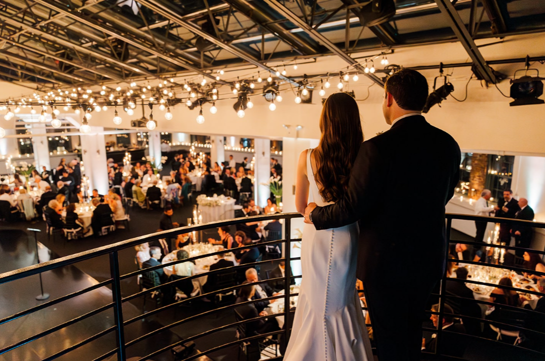 Elegant Tribeca 360 event space with warm lights, perfect for weddings and gatherings.