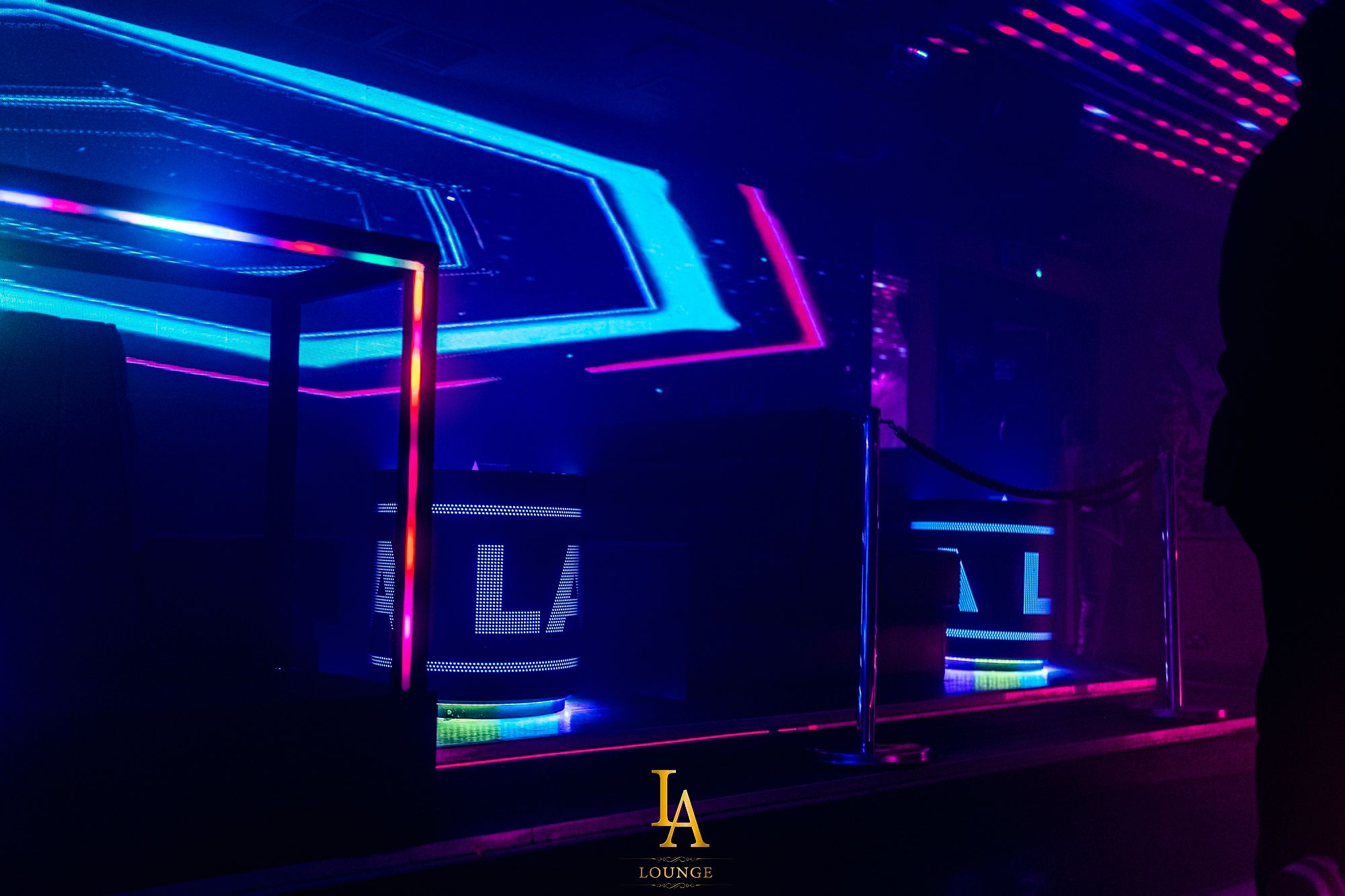 Vibrant LA Lounge event venue with colorful LED lights for nightlife and corporate parties.