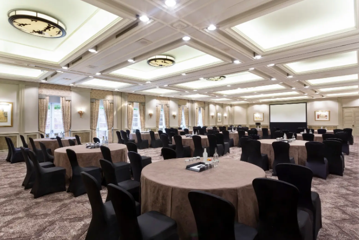 Oulton Suite with round tables, ideal for conferences and social gatherings at Oulton Hall.