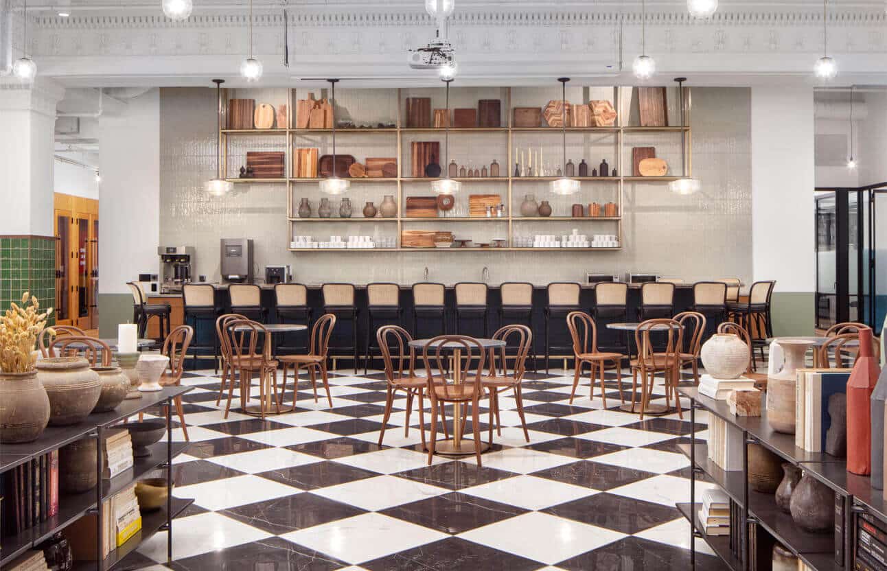 Modern meeting space with checkered floor, ideal for events and networking.