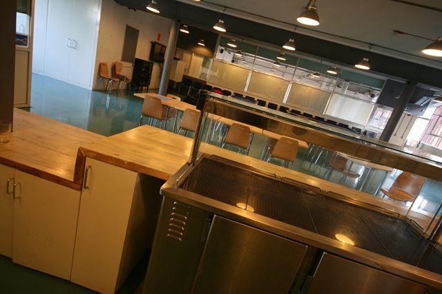 Modern event space at The Harrow Club with natural light, ideal for meetings and workshops.