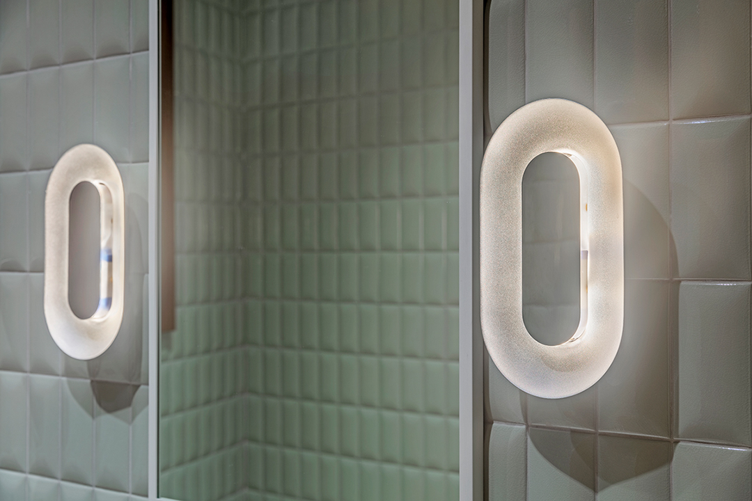 Luxury treatment room with modern lighting and sleek design for event comfort.