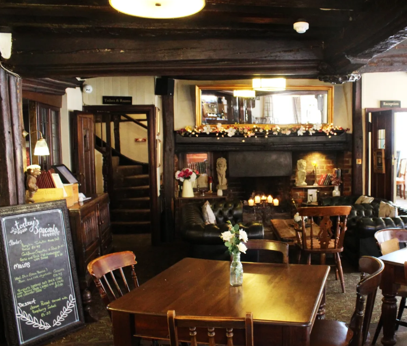 Cozy Ivy Room at The Lion Hotel, ideal for intimate meetings and gatherings.