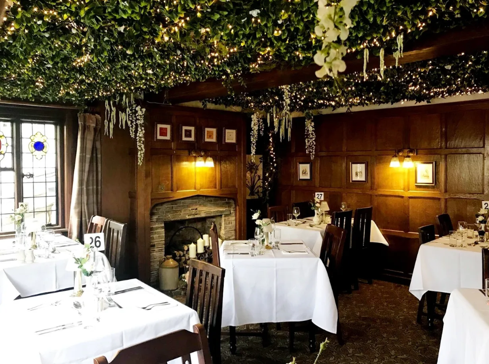 Intimate dining at The Ivy Room, featuring elegant decor for events and gatherings.
