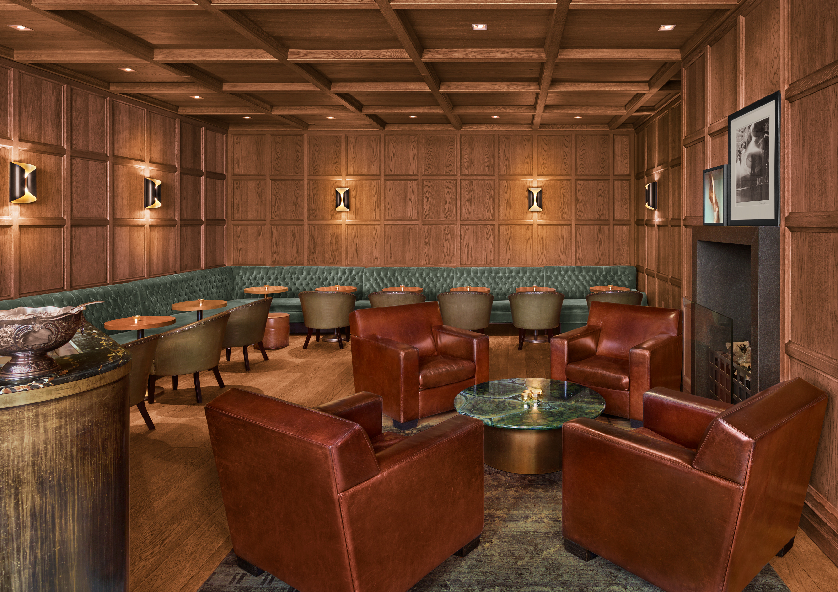 Punch Room at The London EDITION: elegant meeting space with rich wood paneling, ideal for networking.