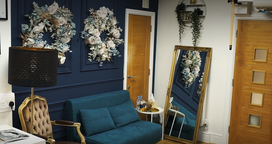 Chic lounge area with floral decor, perfect for networking and informal meetings.