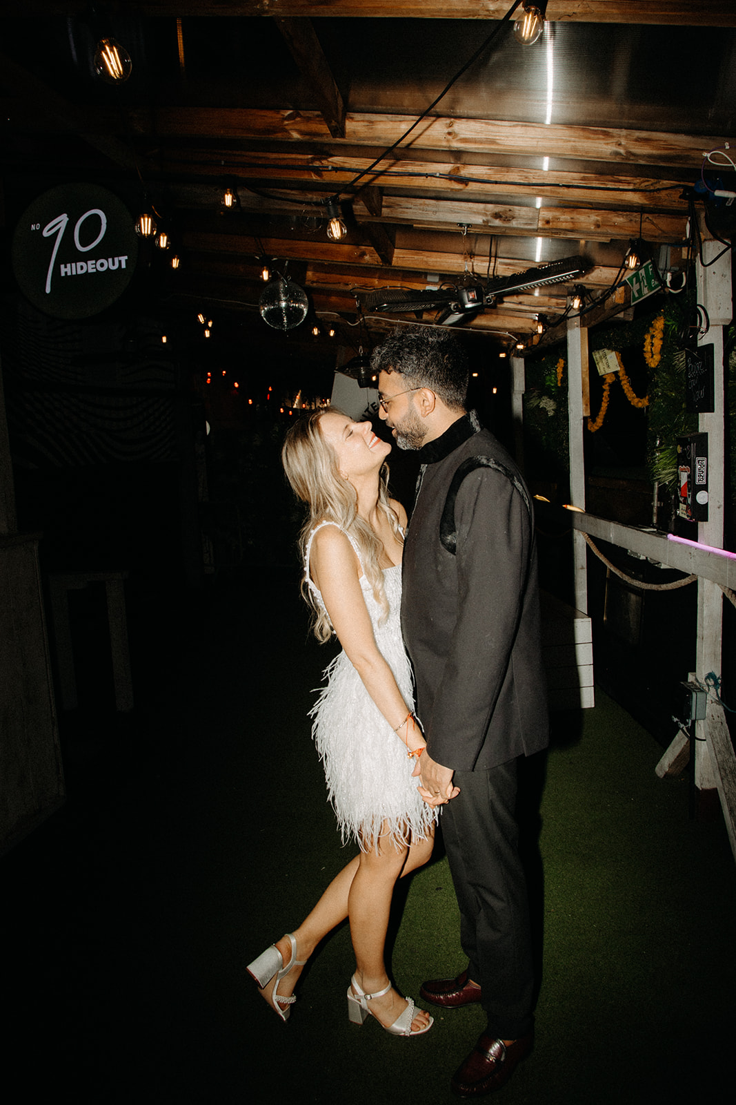 Couple in romantic embrace at No90 Hackney Wick, ideal for weddings and private events.
