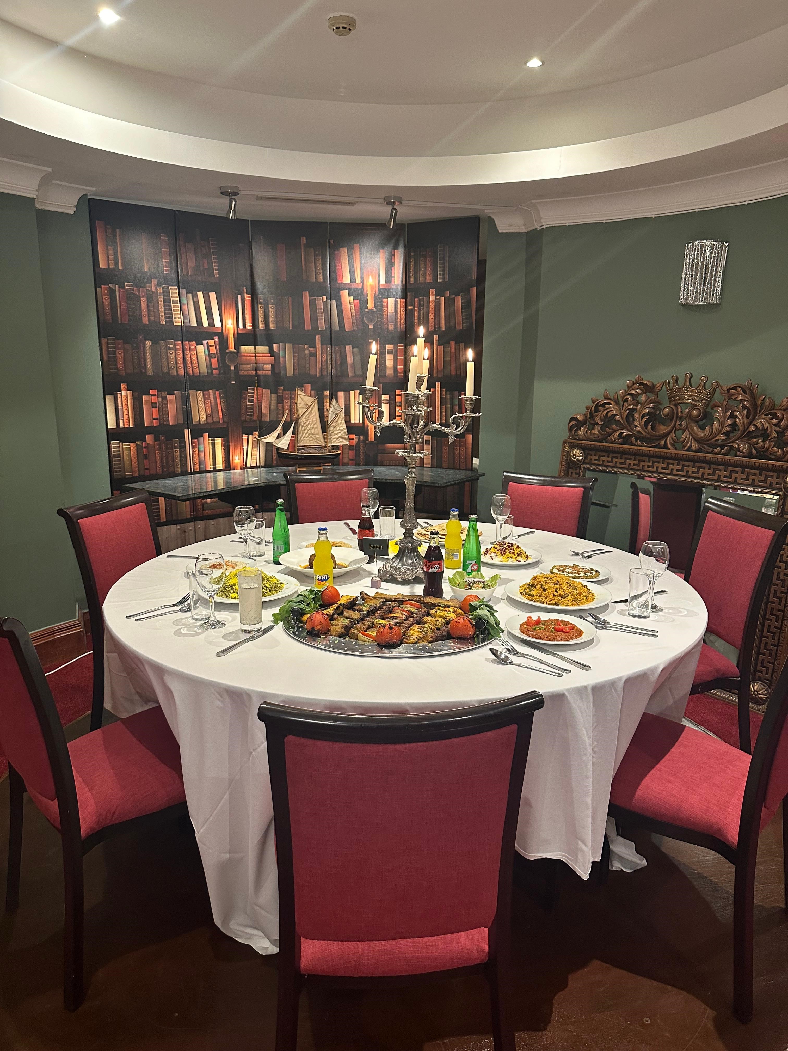 Private dining table with candelabras at Jananeh Restaurant & Bar for corporate events.