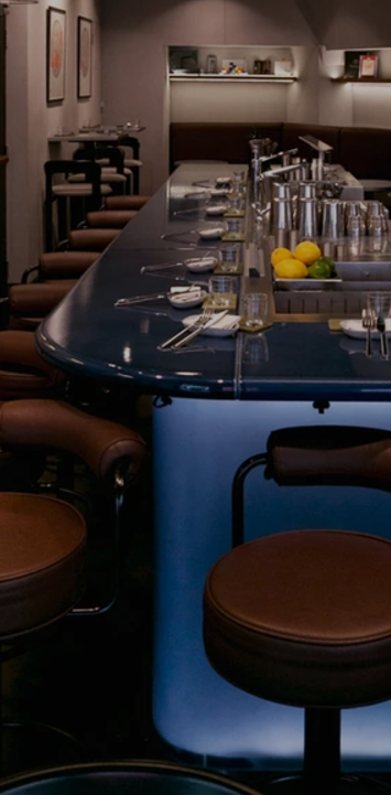 Sleek cocktail bar setup at Atelier Coupette for intimate gatherings and meetings.