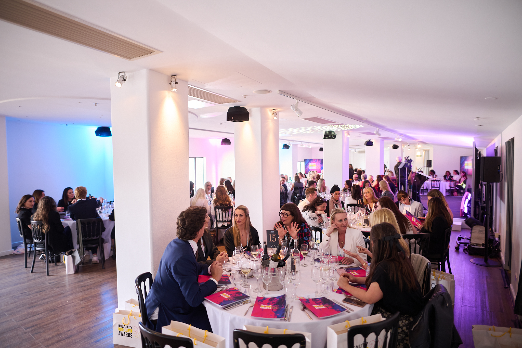 Elegant West Wing event space in OXO2 set for formal dinner and networking.