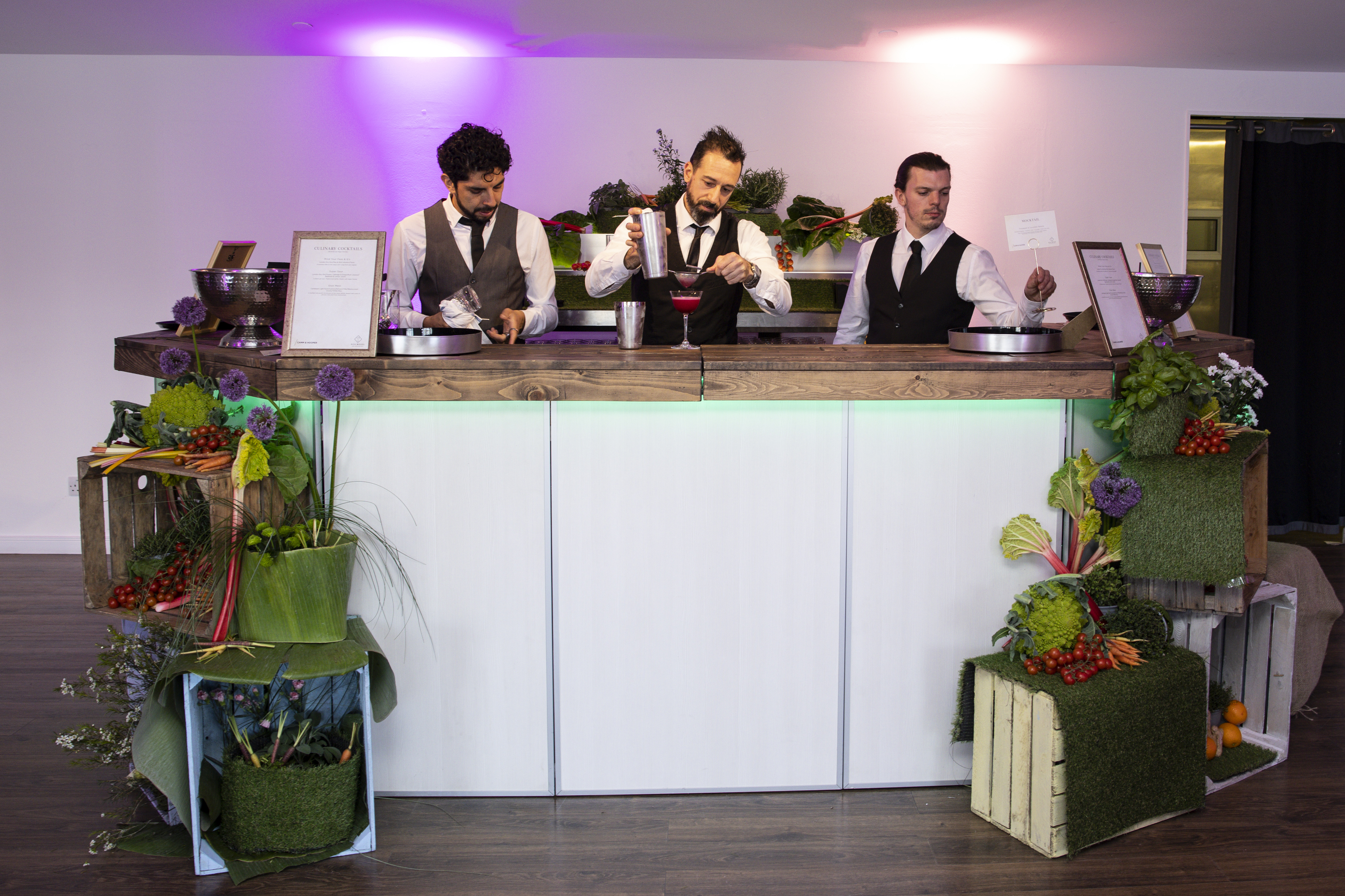 Stylish bar setup with bartenders in OXO2, perfect for events and guest engagement.