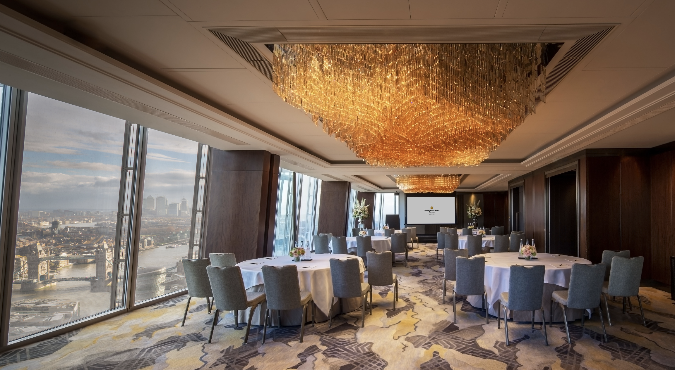 Shangri-La The Shard meeting room with elegant decor and city views, ideal for corporate events.