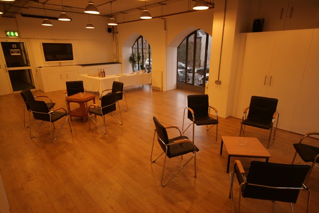 Conference Room at The Harrow Club with natural light, ideal for workshops and meetings.