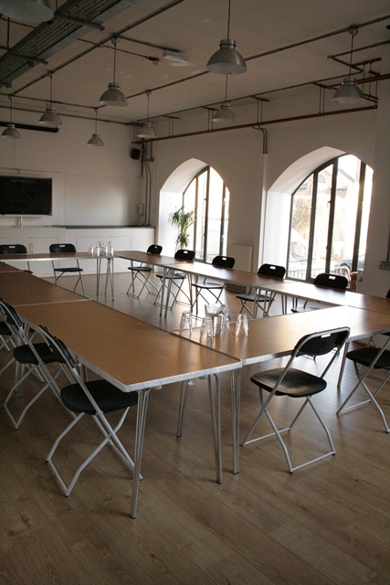 Conference Room at The Harrow Club, U-shaped setup for meetings and workshops.