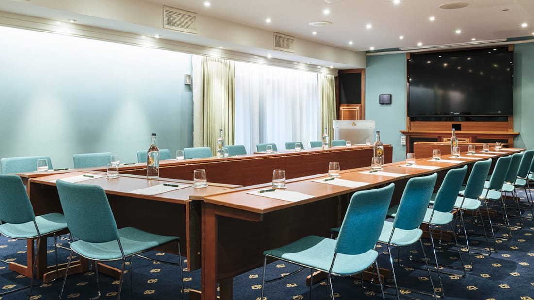 Olavsalen meeting room with U-shape table, ideal for corporate events and brainstorming.