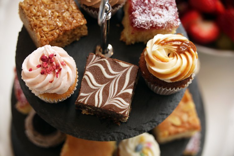 Elegant tiered dessert display at Riverside Cafe for afternoon teas or networking events.