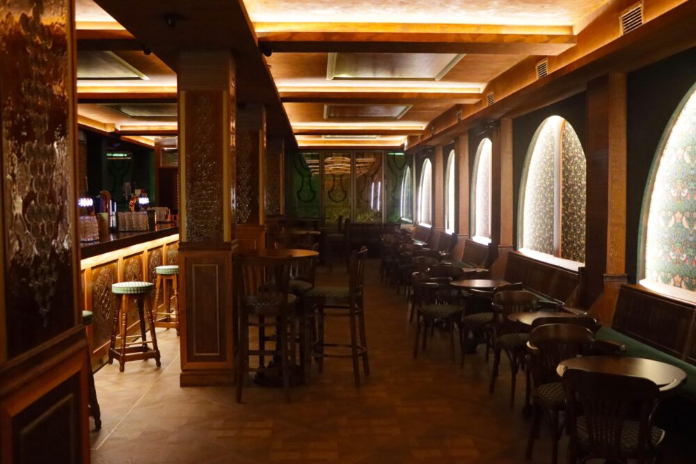 Cozy event space at Eden Café Bistro with wooden furnishings for intimate gatherings