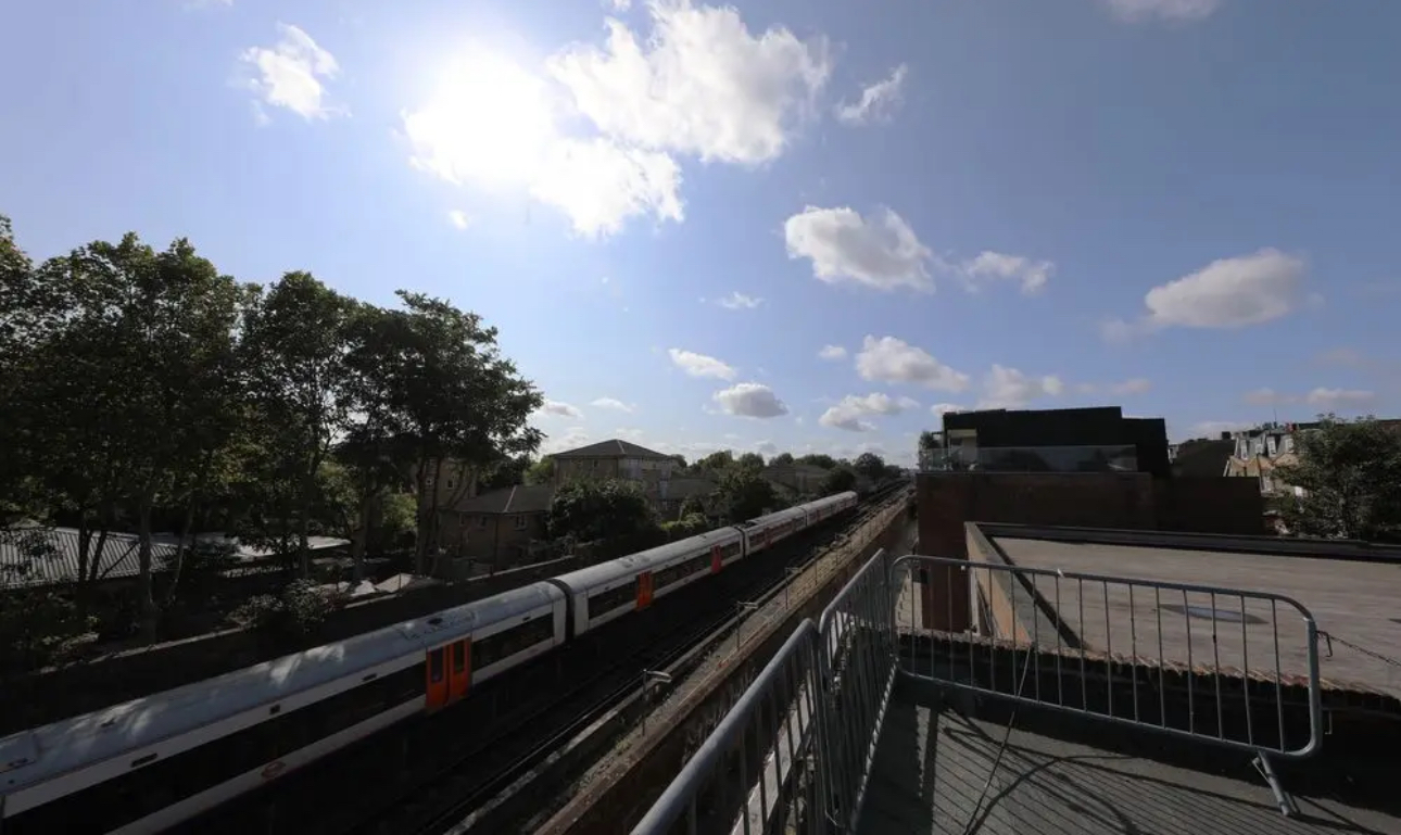 Victorian Industrial Rooftop with greenery, ideal for outdoor networking events.