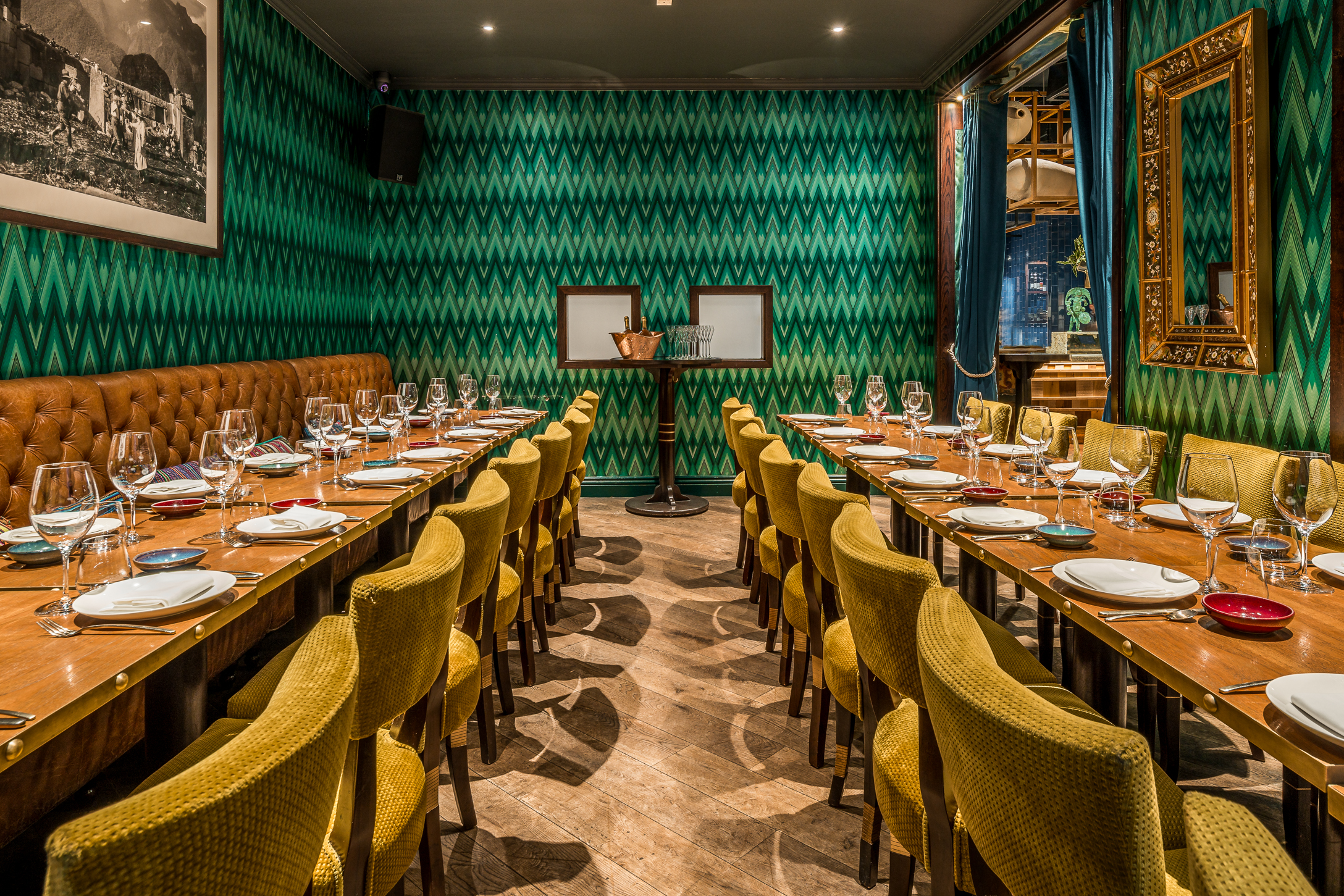 Inti Room at Coya City: intimate dining space with vibrant decor for upscale events and meetings.