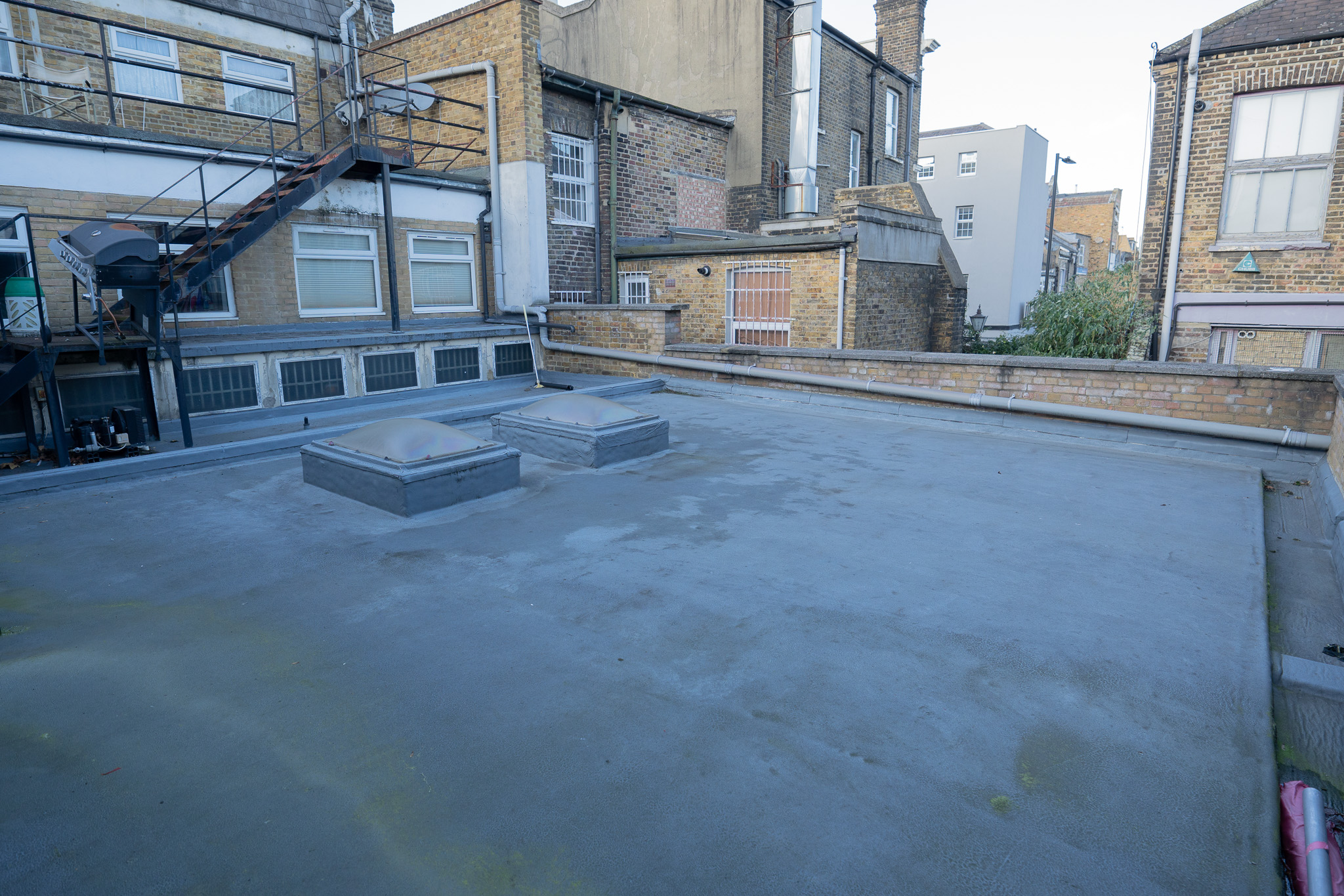 Urban rooftop venue for events in Dollhouse, featuring unique Victorian industrial design.