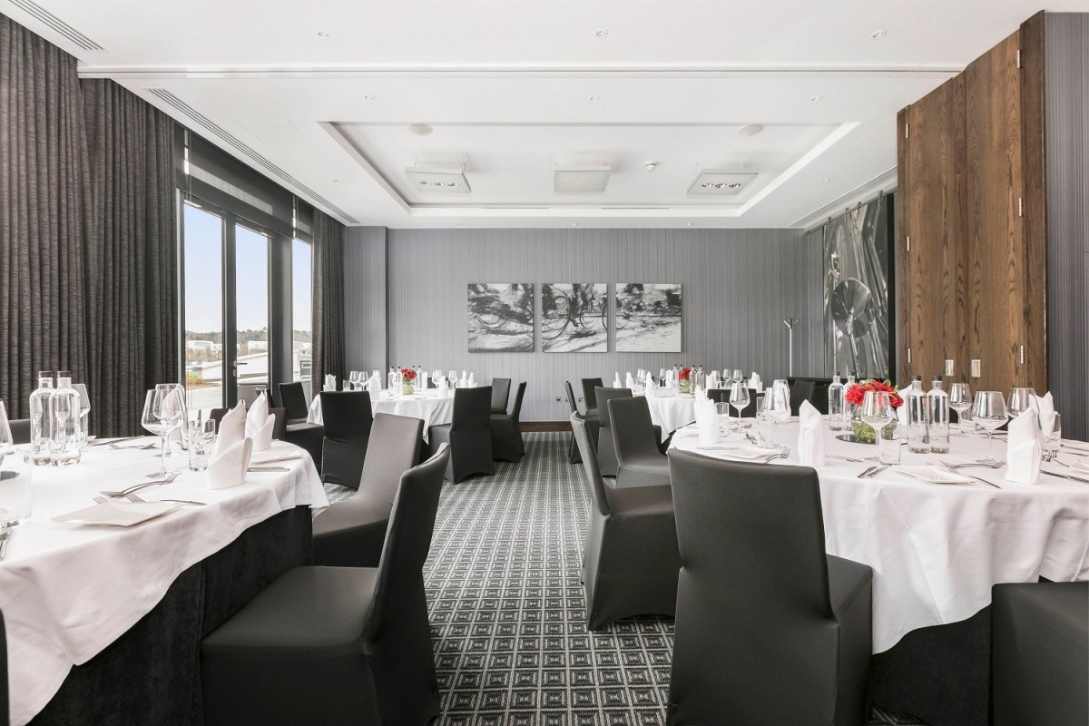 Private dining room at Brooklands Hotel with elegant table setup for corporate events.