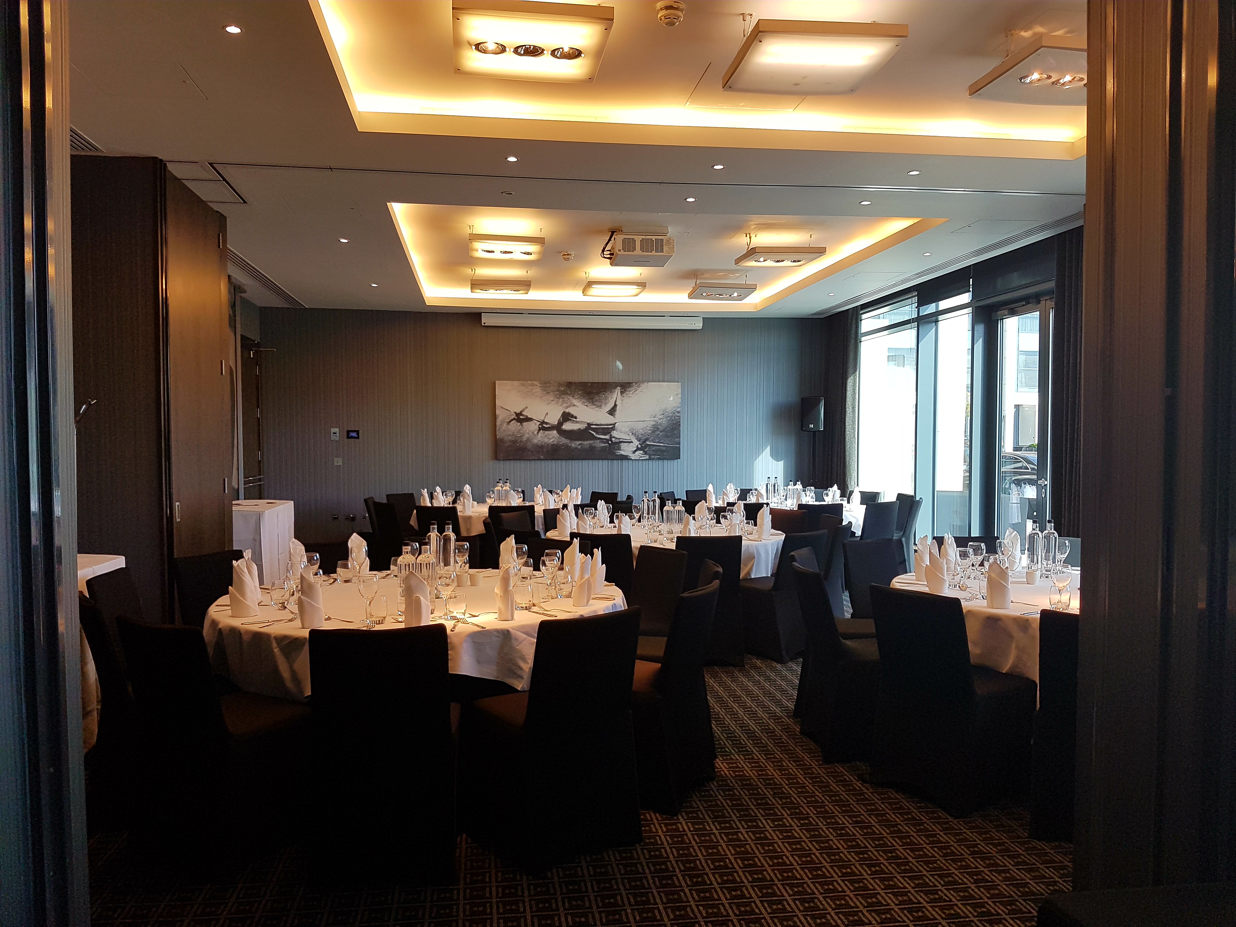 Napier Suite at Brooklands Hotel, elegantly arranged for corporate meetings and weddings.