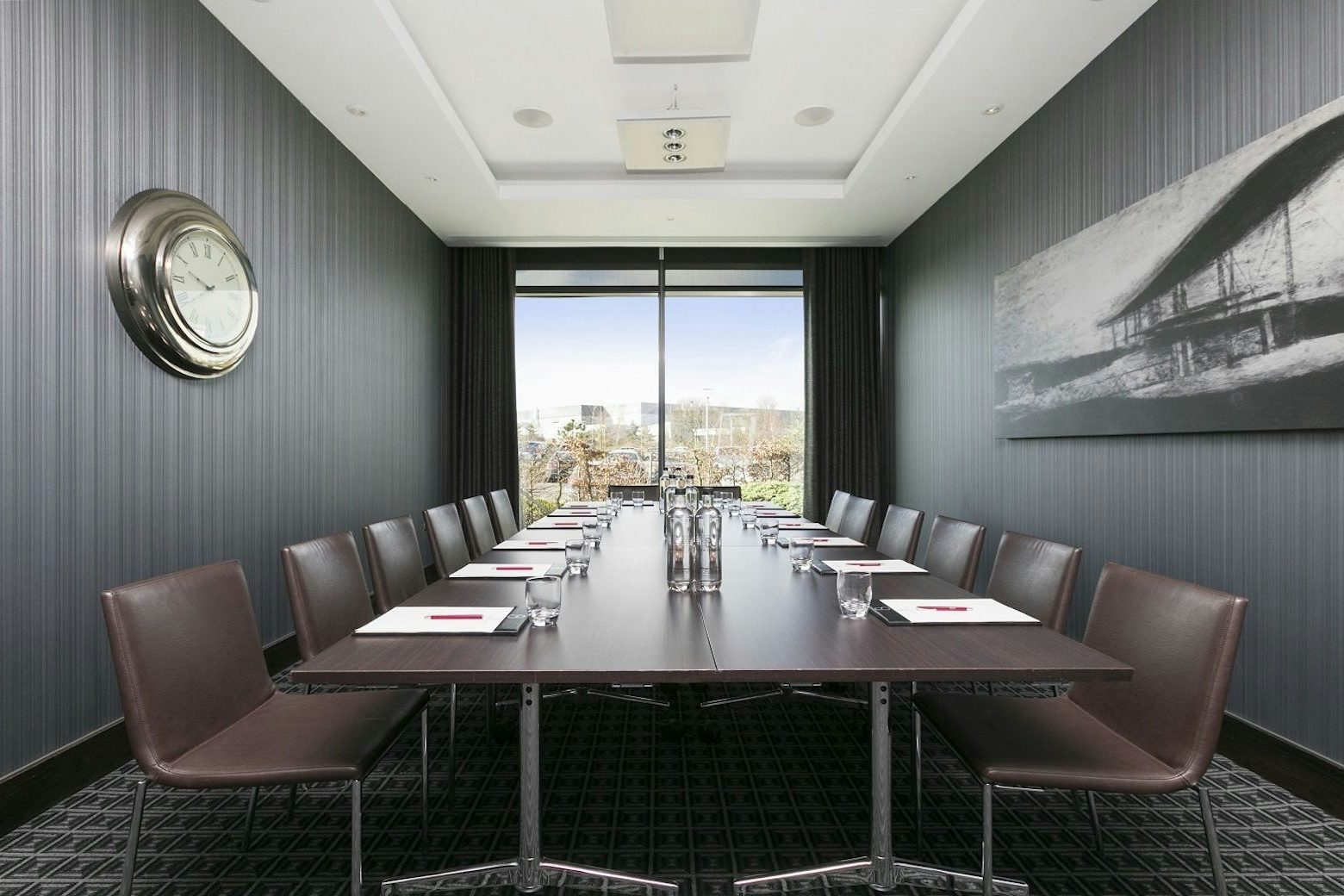 Modern boardroom at Brooklands Hotel, ideal for corporate meetings and presentations.