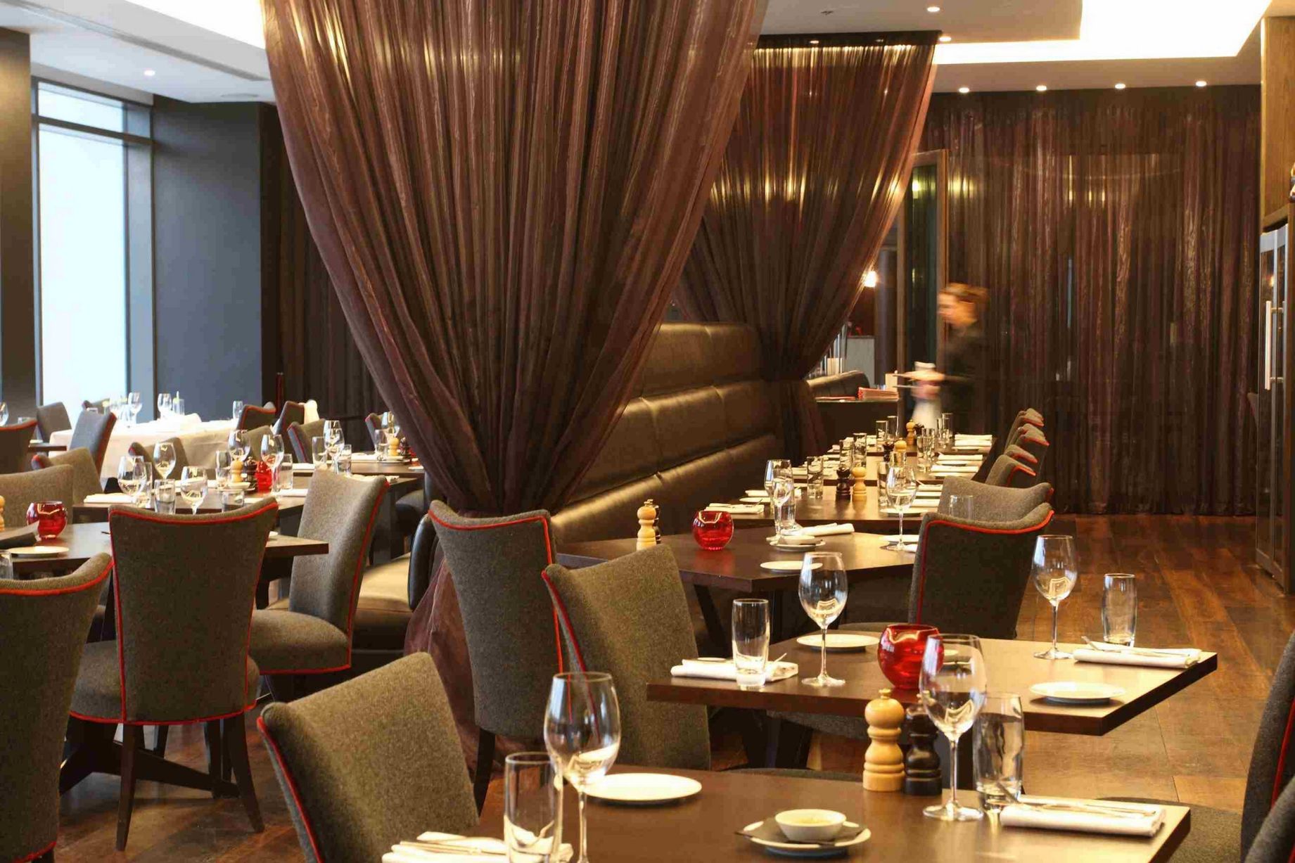 Modern restaurant setting at Brooklands Hotel, perfect for intimate gatherings and meetings.