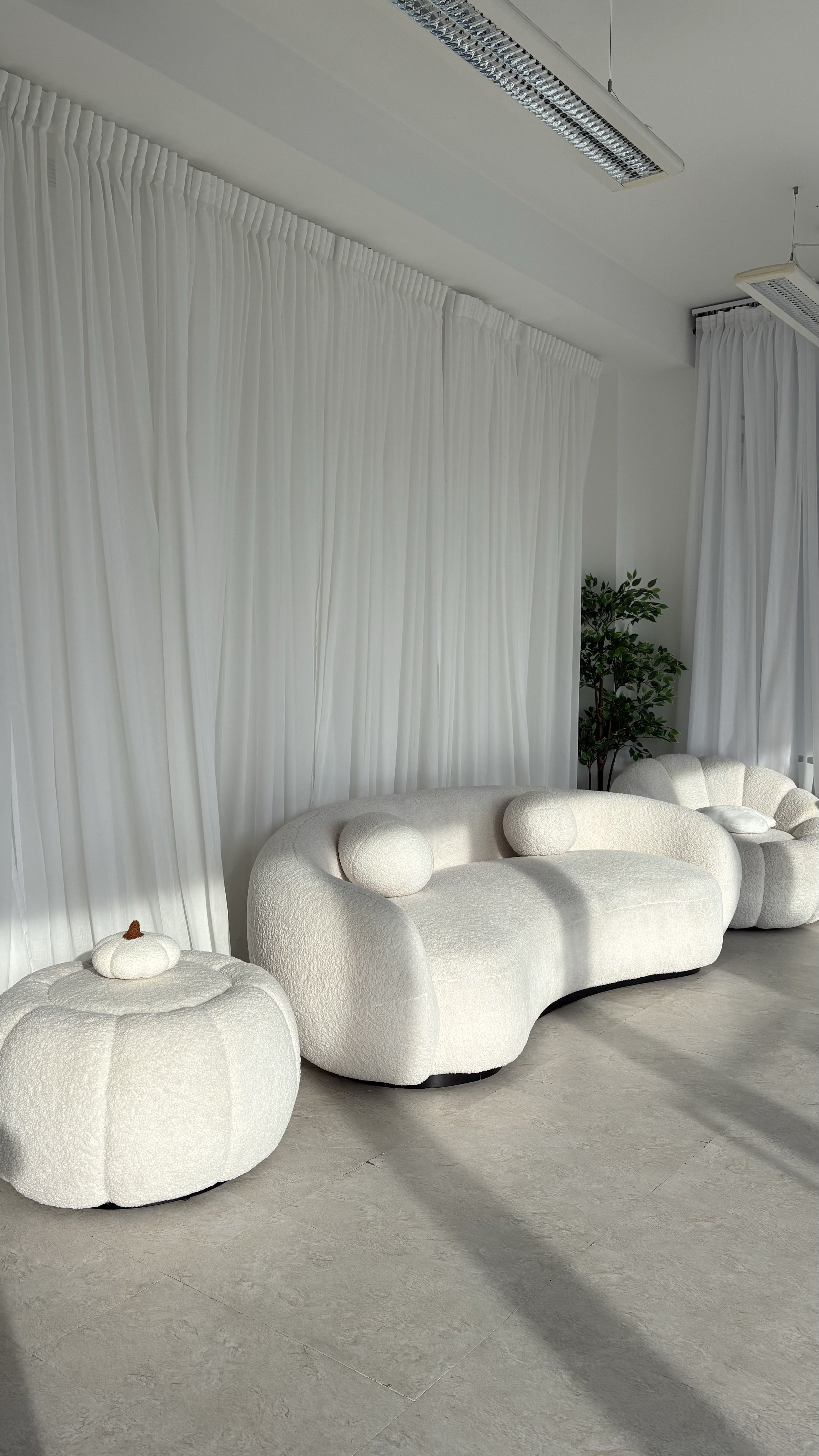 Sophisticated lounge area with textured furniture, ideal for networking events and meetings.