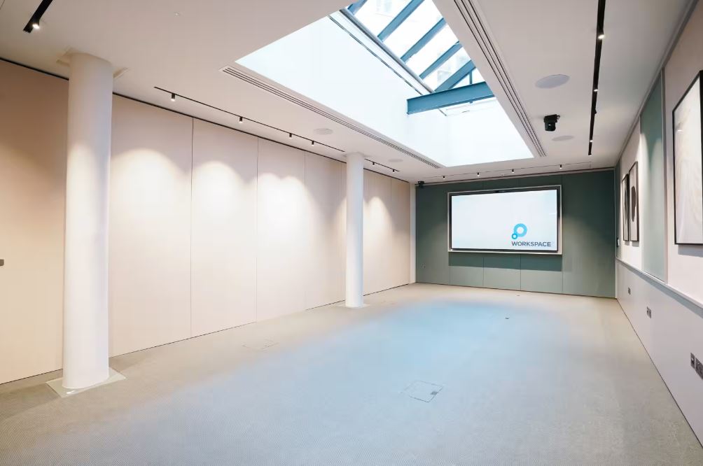 Versatile event space at Salisbury House with skylights, ideal for corporate events and workshops.