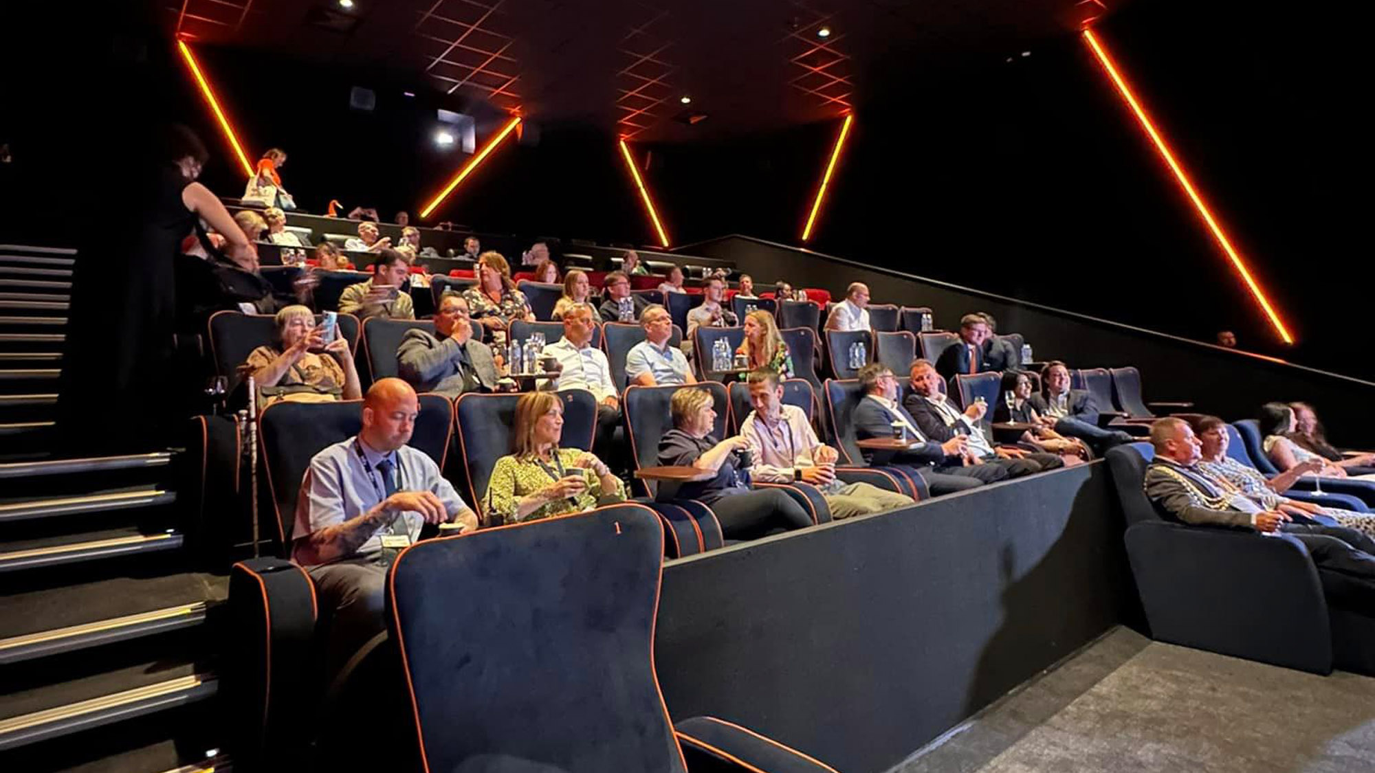 Modern cinema venue with plush seating for networking and presentations in Redhill.