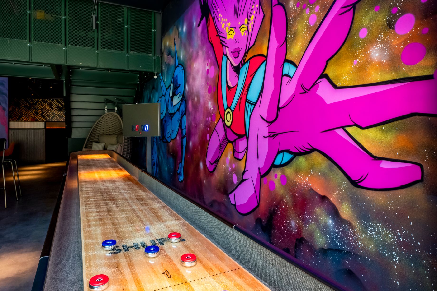 Mini Golf at The Light Redhill with vibrant mural, ideal for events and team-building.