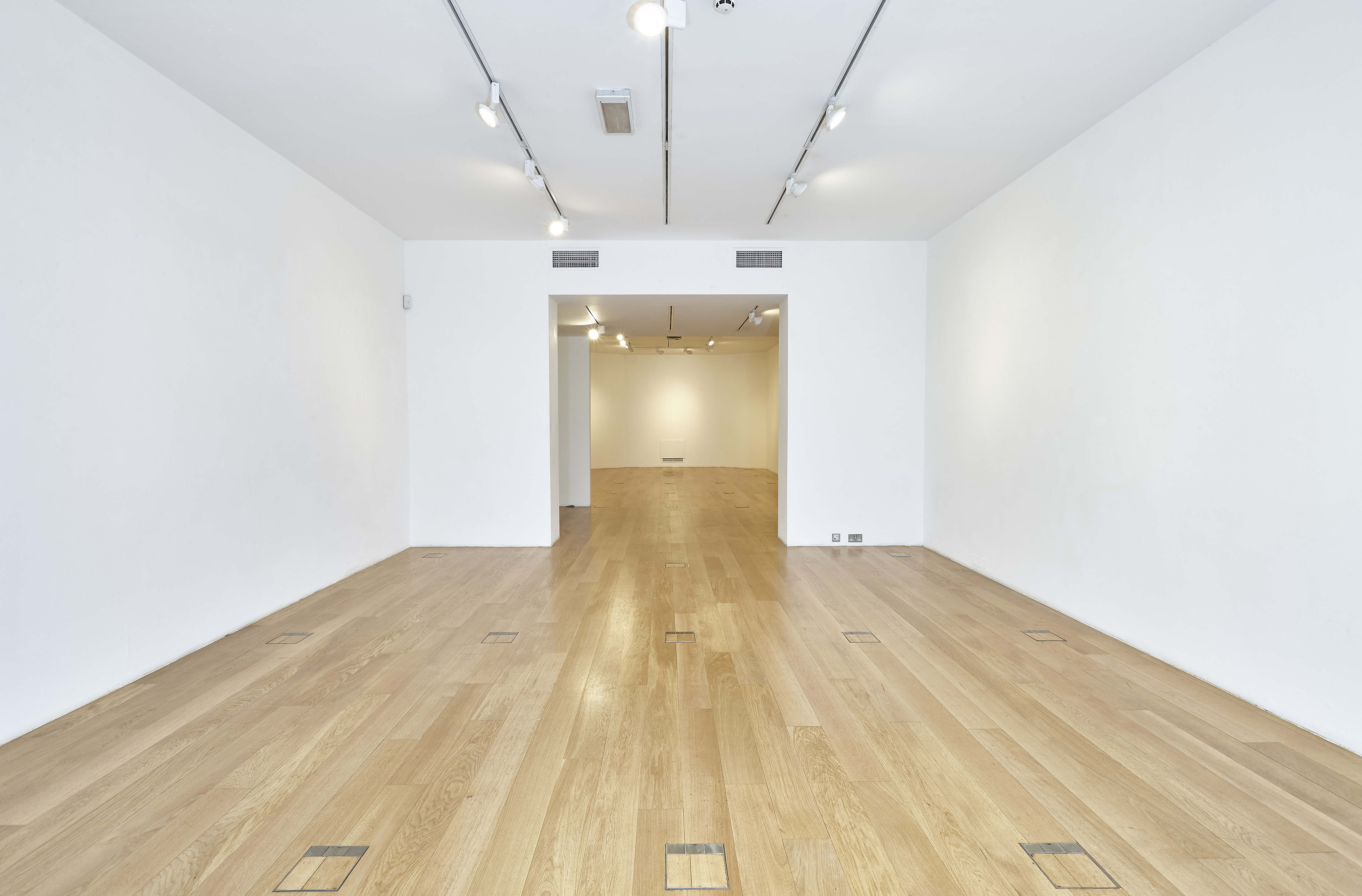 Spacious minimalist venue at Asia House, perfect for corporate events and workshops.