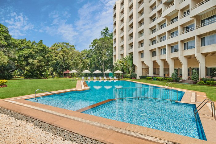 Pristine pool at Kalinga, LaLiT Ashok Bangalore - perfect for outdoor events and gatherings.