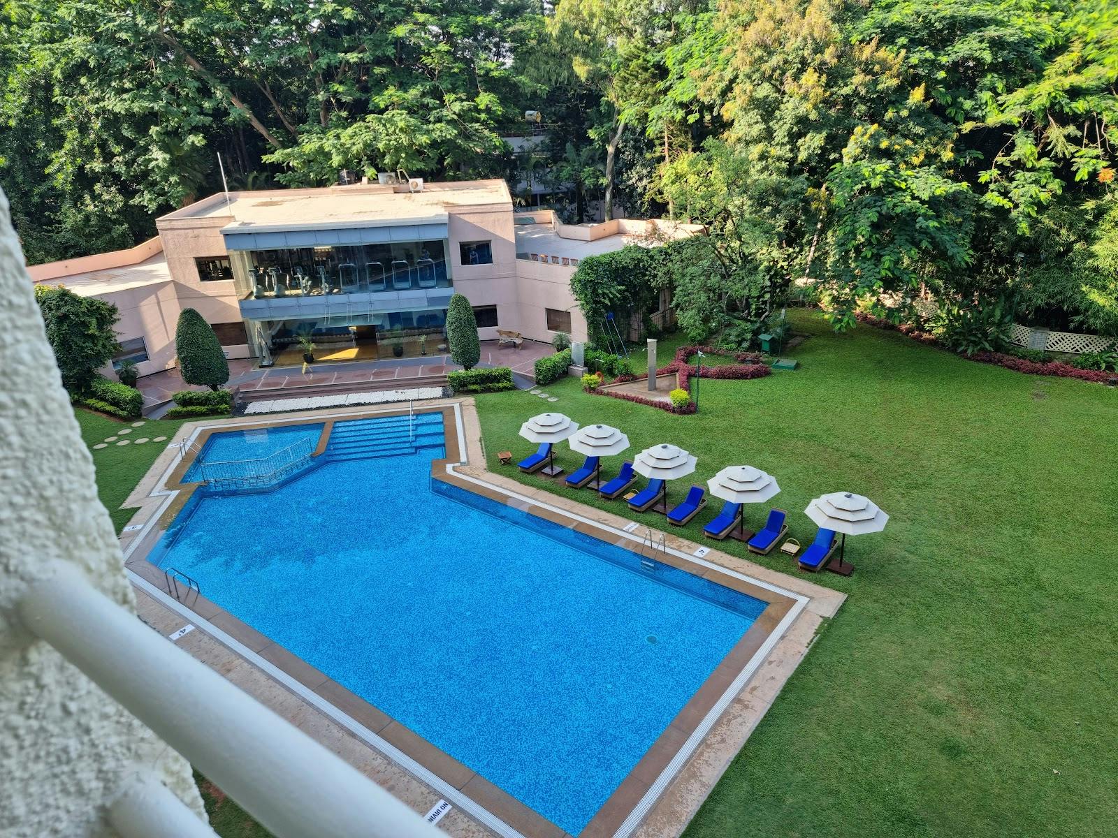Lalit 3 & 4 venue with pool in LaLiT Ashok for corporate events and retreats.