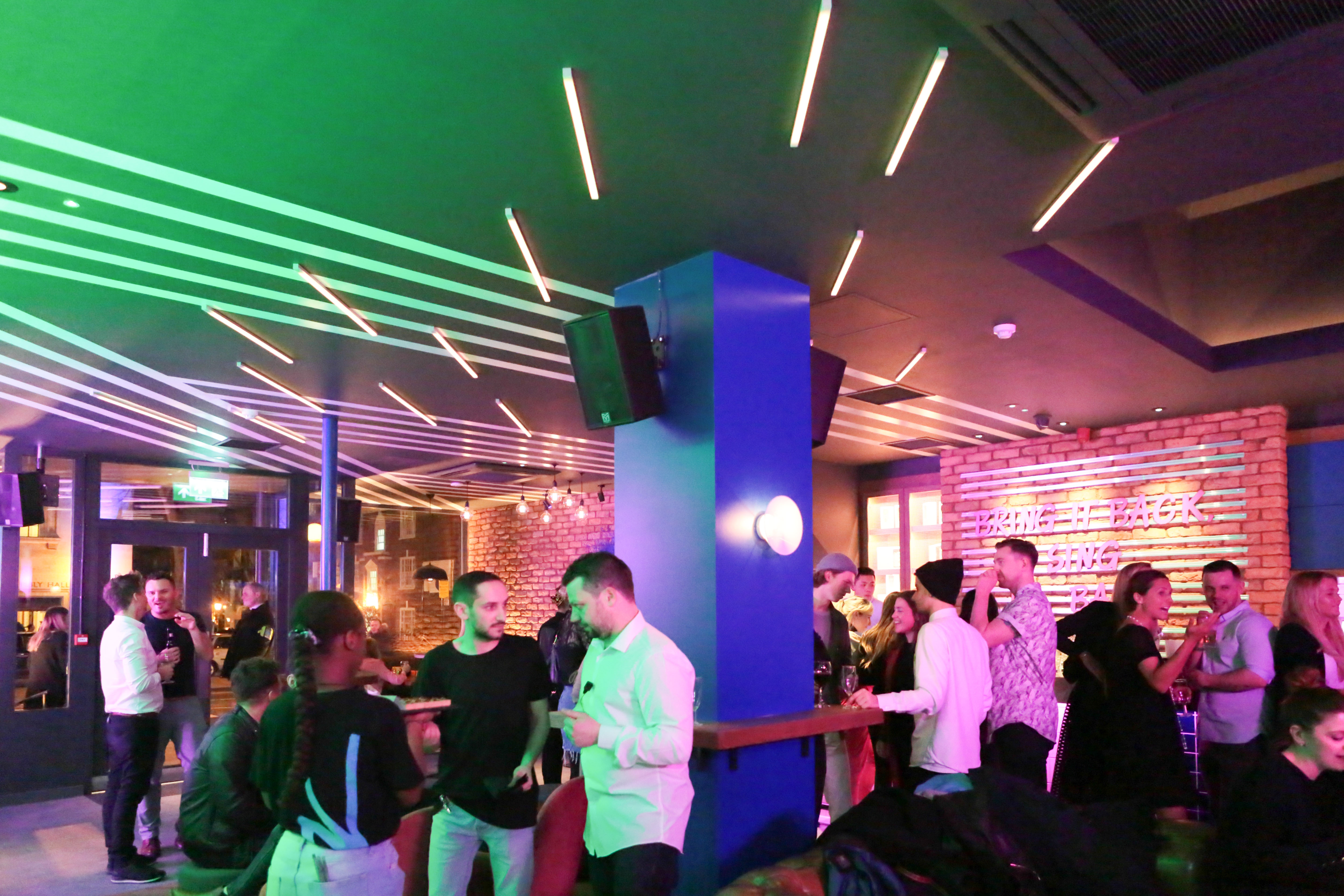 Vibrant event space at Lucky Voice Islington, ideal for networking and parties.