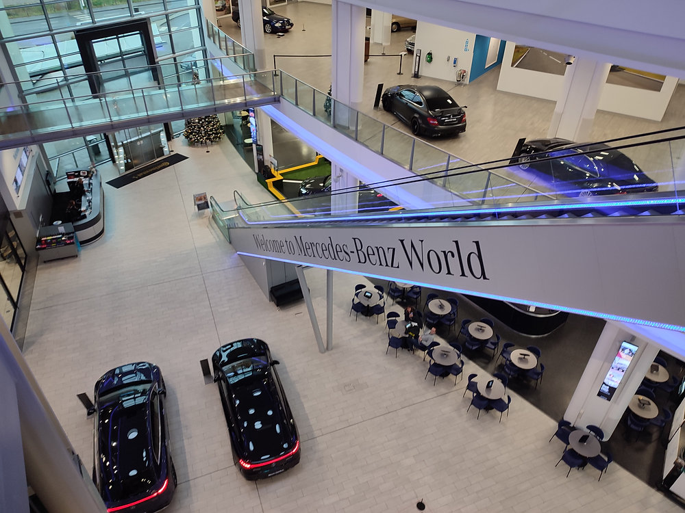 Sleek Mercedes-Benz World cinema venue for corporate events and product launches.