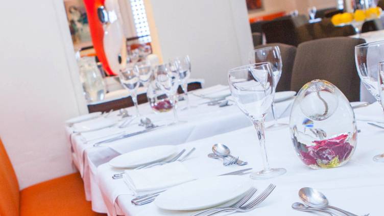 Elegant dining table at Salloos Bar, perfect for events and gatherings.